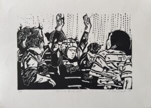 Front row of a women's rugby scrum preparing to engage the opponents.